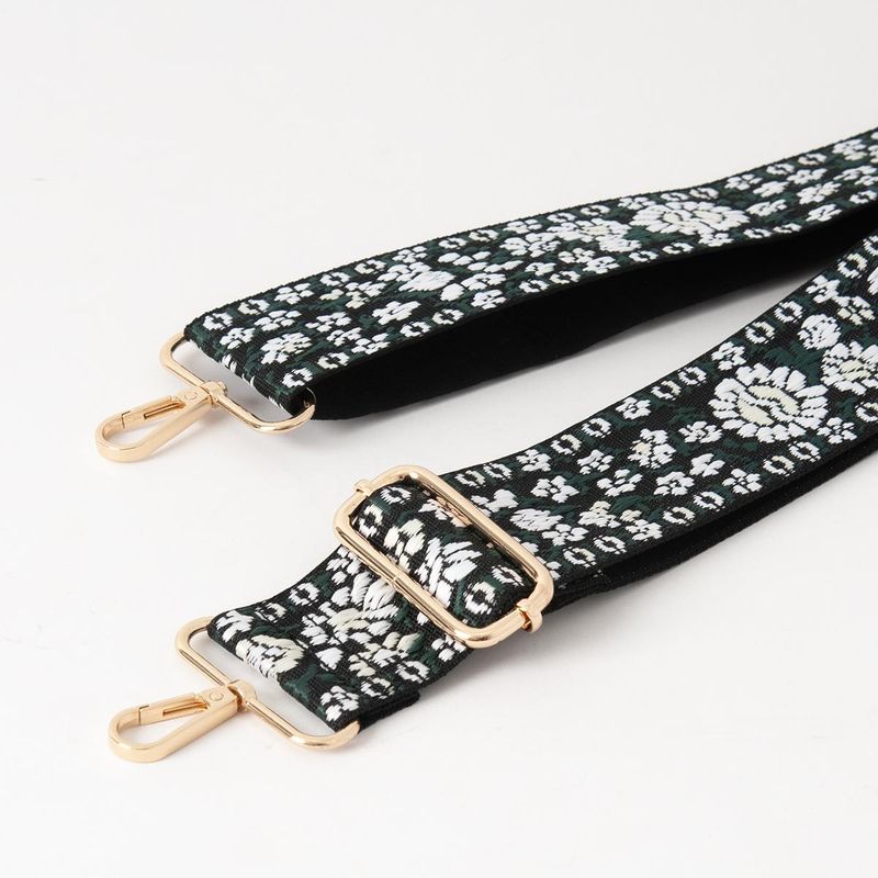 Skulderrem med vevede blomster - grønn