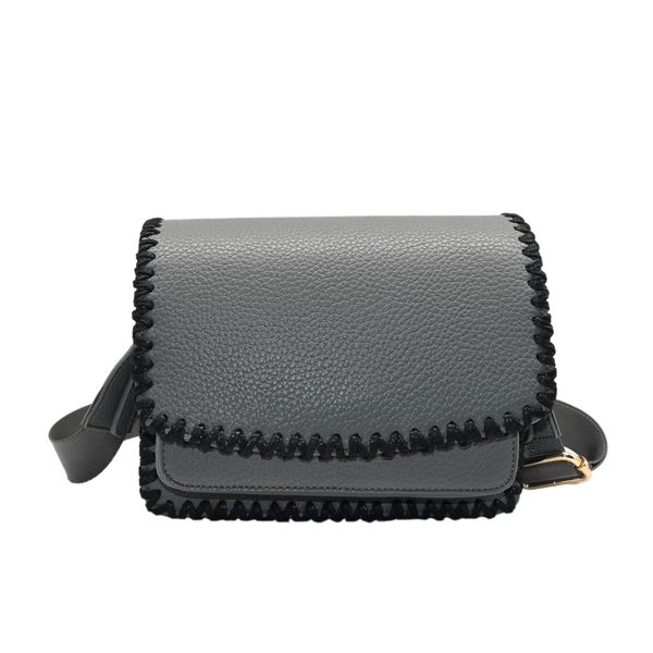 Bilde av CAMILLE clutch med søm - grå